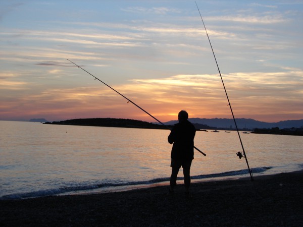 fishing at sunset
